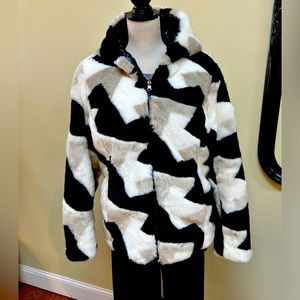 Renuar Reversible fur jacket.  Cream, white and black. Two pockets on each side.